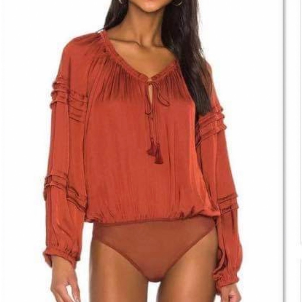 NWOT Free People Long sleeved Body Suit Orange balloon puff sleeve body suit